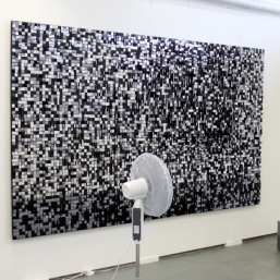 The Big Bang. 175cm x 300cm. Sequins, pins and spray paint on cork and MDF. Office fan. 2011.